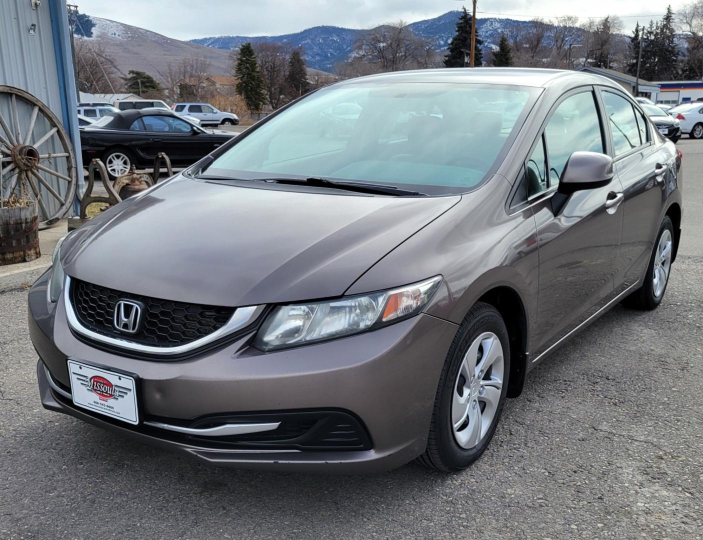 2013 Brown /Tan Honda Civic LX (2HGFB2F57DH) with an 1.8L I4 engine, 5 Speed Automatic transmission, located at 450 N Russell, Missoula, MT, 59801, (406) 543-6600, 46.874496, -114.017433 - Photo#4